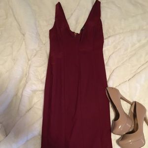 Form fitting midi dress by CQ.